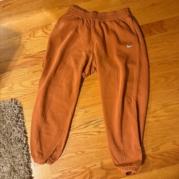 Nike Women's Rust Orange Fleece Joggers - Picture 1 of 4